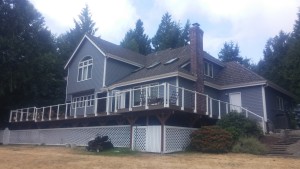 indigo painting exterior rear view with deck and lattice